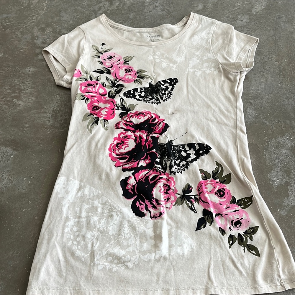Express T-shirt with flower design. Size small.